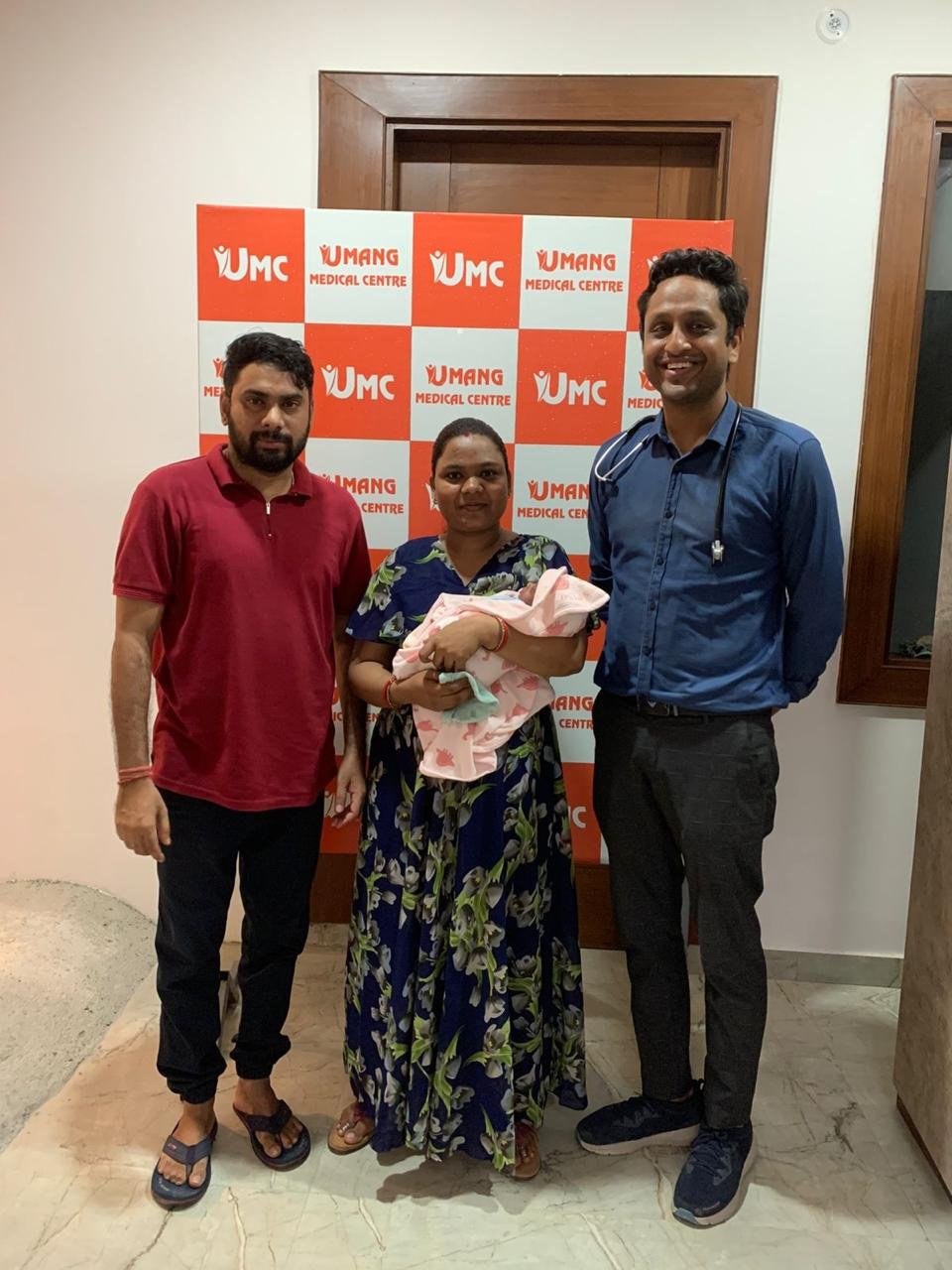 Family and medical team at Umang Medical Centre